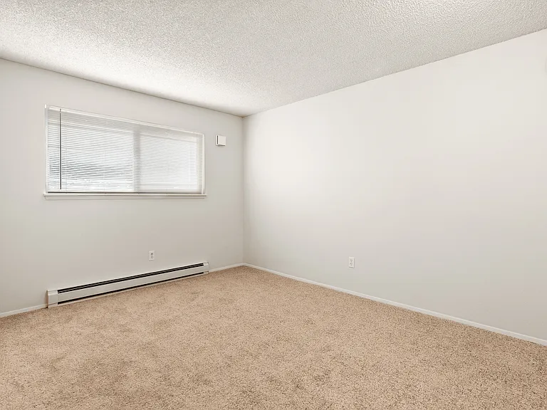 Enjoy ample space and natural light in this inviting bedroom. Enjoy ample space and natural light in this inviting bedroom.