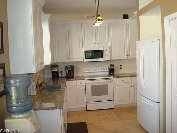 Chef's kitchen with all the bells and whistles! Updated and upgraded French door refrigerator, micro