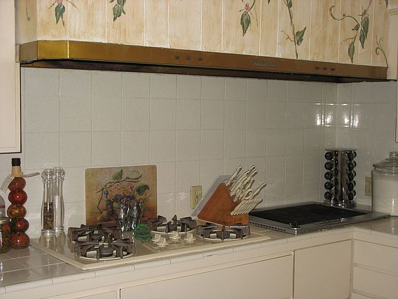 Kitchen features Built-In Grill