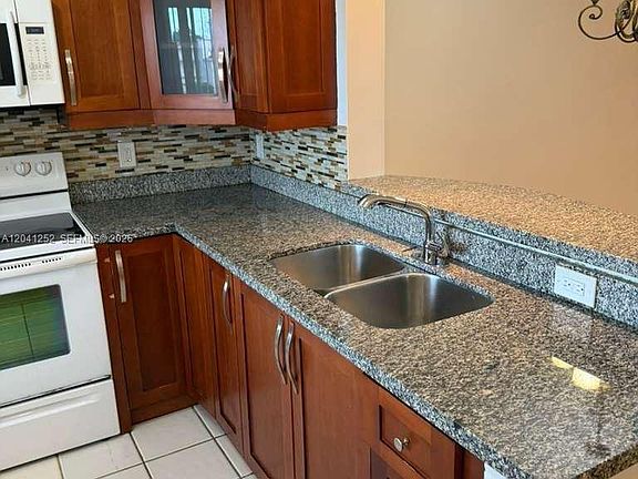 2nd image of 8610 N Sherman Cir APT 508