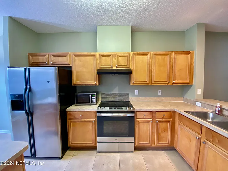 5663 Greenland Rd #304 — Photo 5