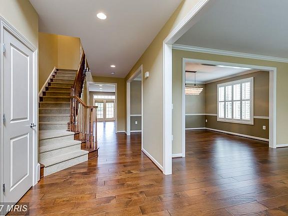 Enter into a 2-story foyer and  open floorplan