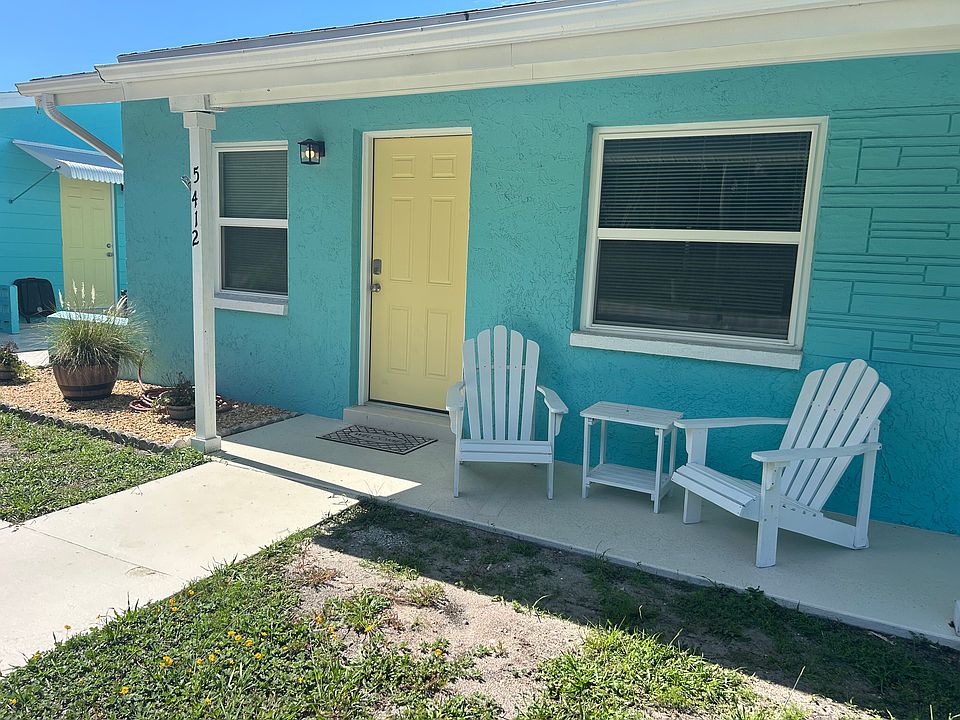 Location! Location! Location! Newly renovated two-bedroom, one bath courtyard villa within walking distance to everything in charming downtown New Port Richey.