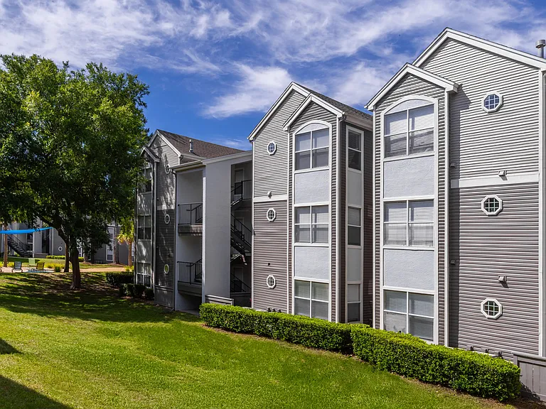 Surrounded by mature trees and open green space, The Enclave offers freshly painted buildings in a serene setting just steps from your front door.
