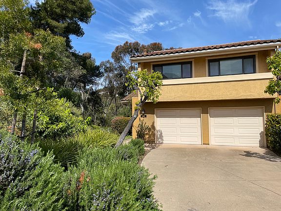 Driveway + 2-Car Garage