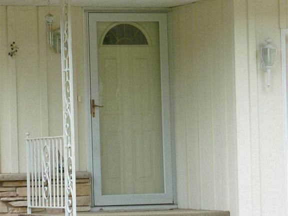 Covered porch greets guests