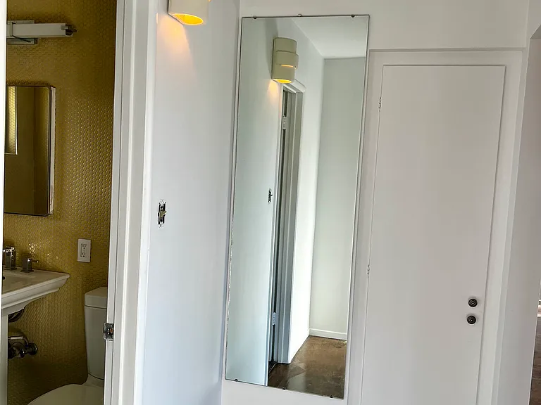 Hallway leading to bathroom