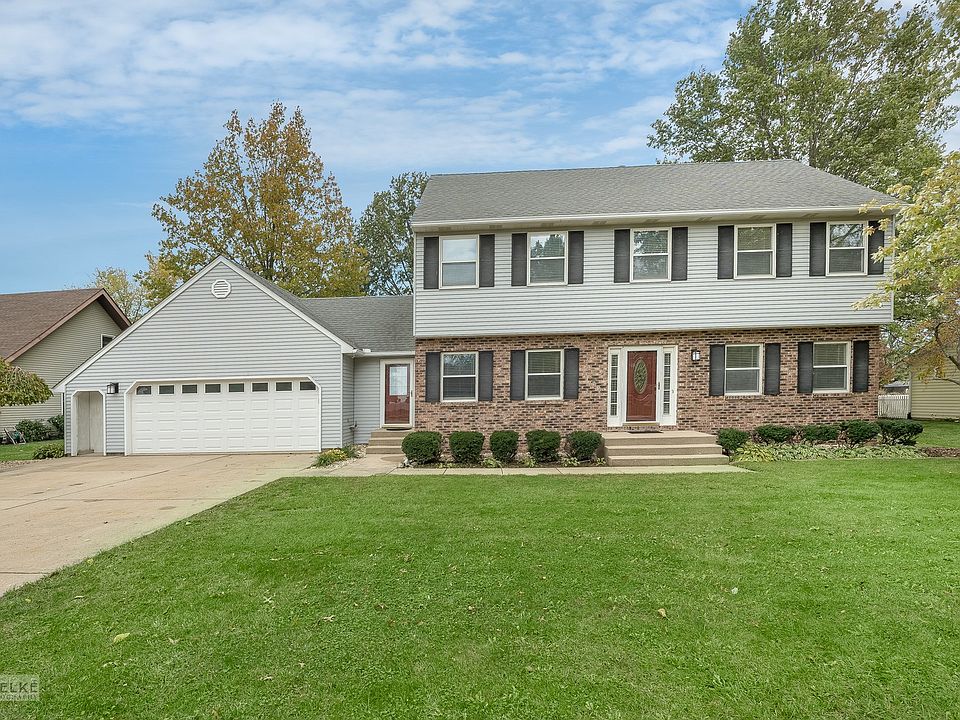Beautiful curb appeal on this beautiful home with oversized garage.