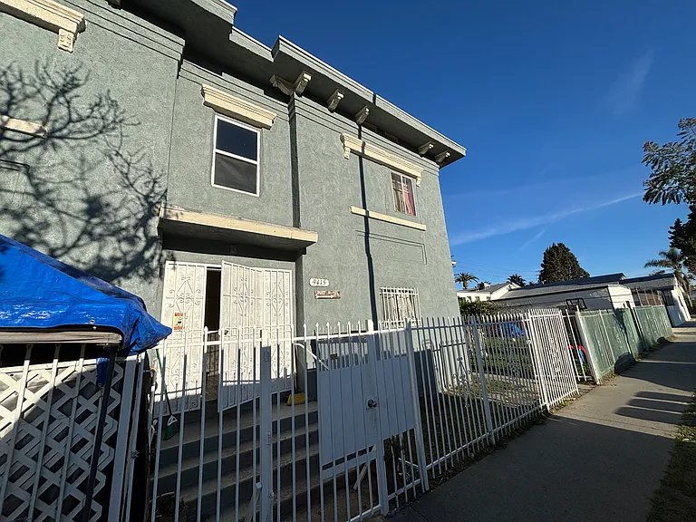 9415 S San Pedro St — Photo 1