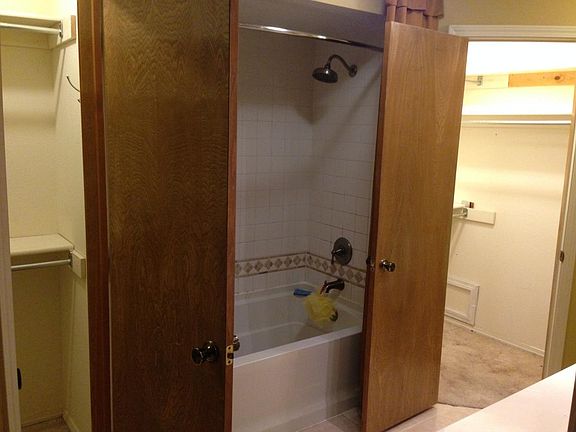 His and her closets in master bath