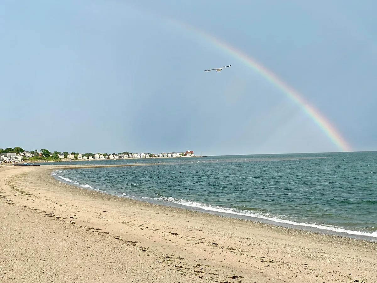 Nestled in the Bay View Beach community, steps from this private beach - 13 East Ave