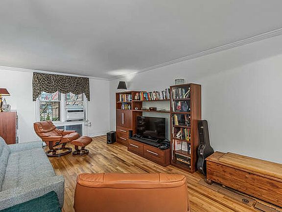 3rd image of 67-25 Dartmouth St APT 3C