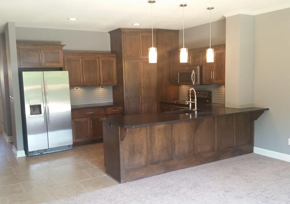 Kitchen with custom-built cabinets on soft close hinges, sta