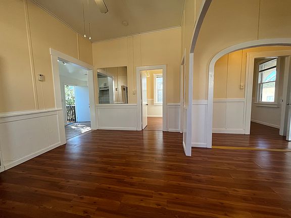 dining area view of bedrooms and kitchen