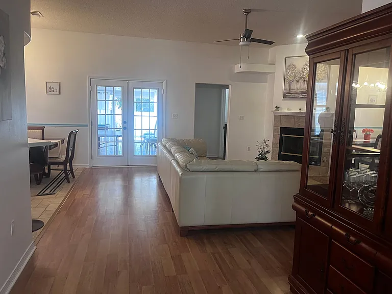 Wood and tile flooring throughout