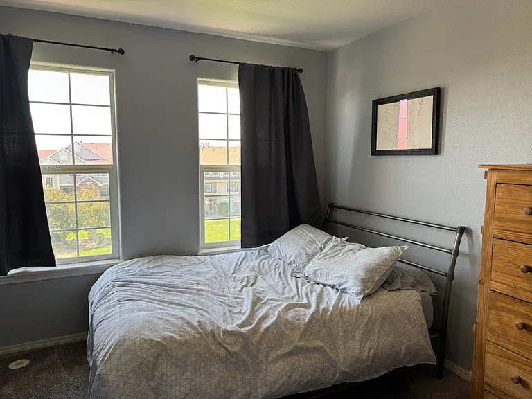 Smaller bedroom. Still plenty of room for a dresser and my workout equipment