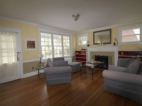 living room main level w wood burning fireplace