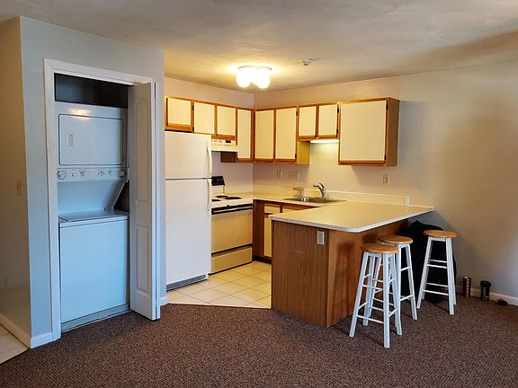 Kitchen with washer dryer, fridge-freezer, oven, food disposal and dishwasher