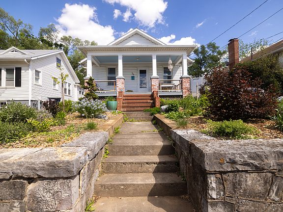 Off-street parking; driveway to the right of the house