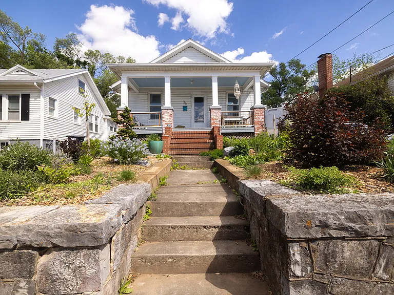 Off-street parking; driveway to the right of the house