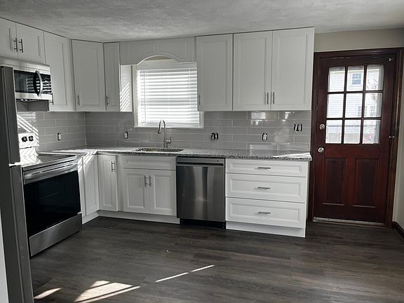 Brand new kitchen. New stainless steel appliances, new cabinets and new flooring.