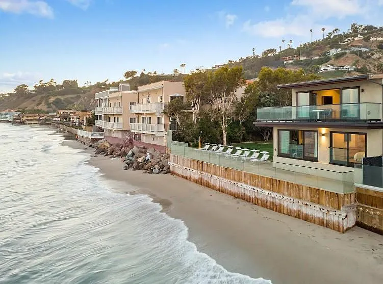 Step down to Carbon Beach directly from the property.