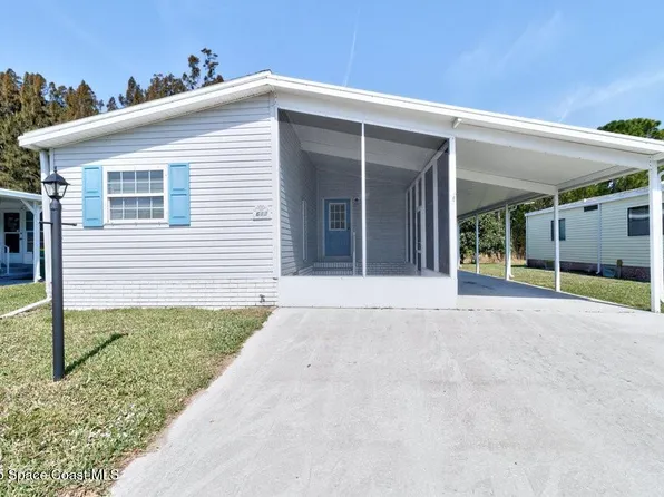 613 Papaya Cir, Barefoot Bay, FL 32976