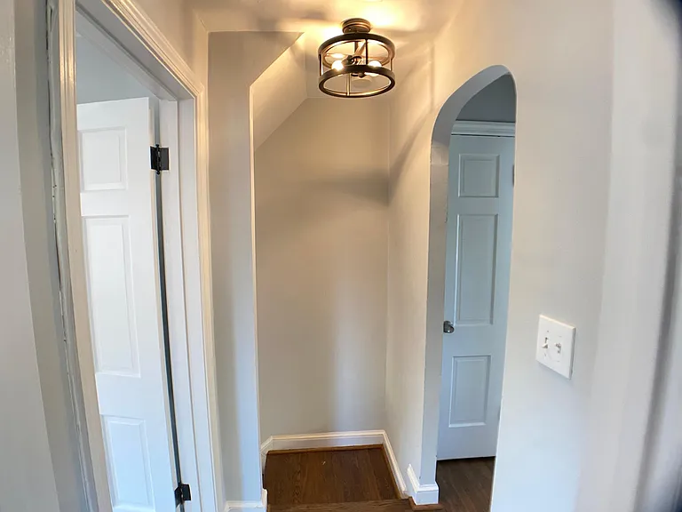 Landing at top of stairs - primary bedroom to left, full bath to the right, bedroom 2 behind you.