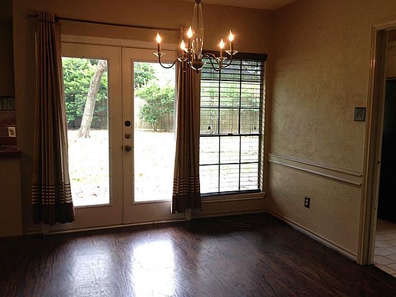 Sunny breakfast room has French Doors