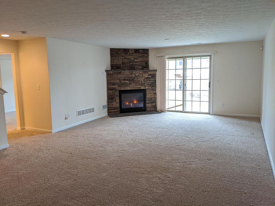 LARGE family room with gas fireplace and patio!