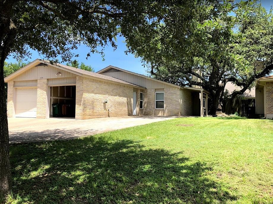 Unit B - with shaded front and back yard. Single-car garage. ideal for storage and cars. A storage this size costs about $150 per month. Energy-efficient double-pane windows after remodel.