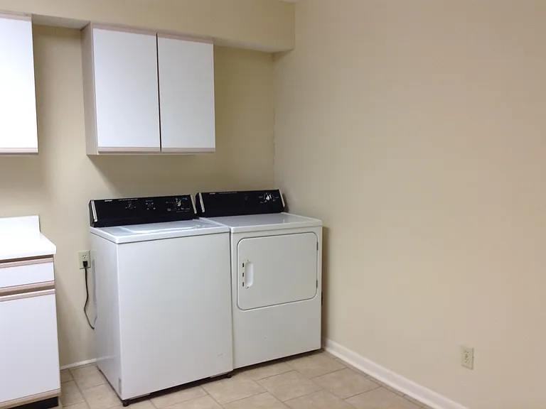 Third pic of kitchen, showing washer and dryer. Kitchen also has room for small dinette.
