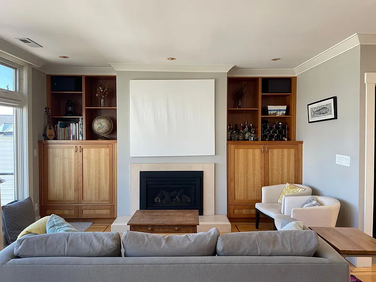 Living area (built-in cabinets, where 37" TV can fit on a slide out rotating shelf)