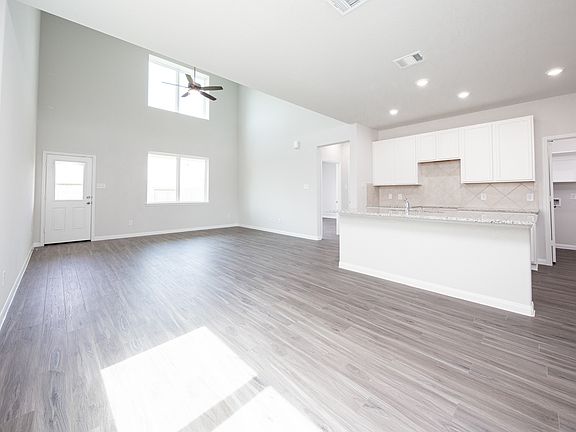 Dining Area to Kitchen and Family Room