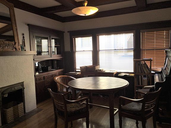Formal dining room with fire place
