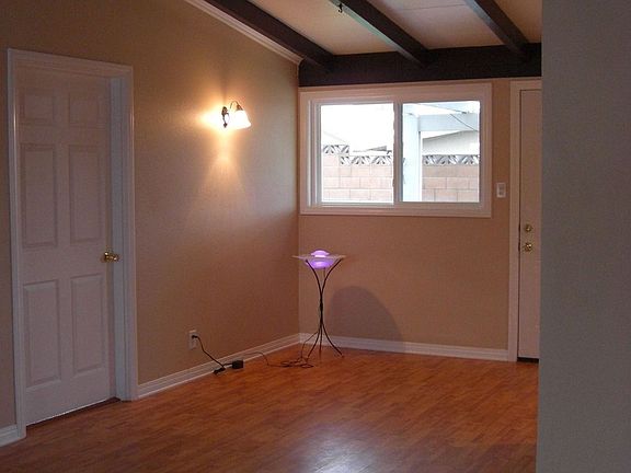 Living room w/ laminate wood floors 