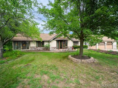 5855 Grand River Dr NE, Ada, MI, 49301