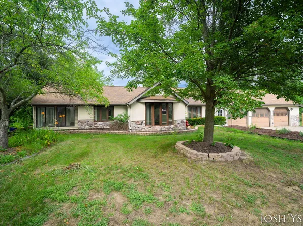 5855 Grand River Dr NE, Ada, MI 49301