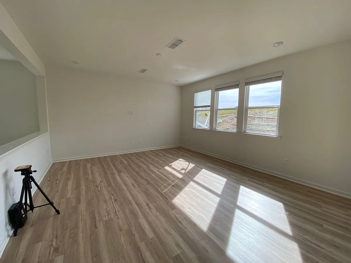 Living room full of natural light - 452 Thorny Branch Dr