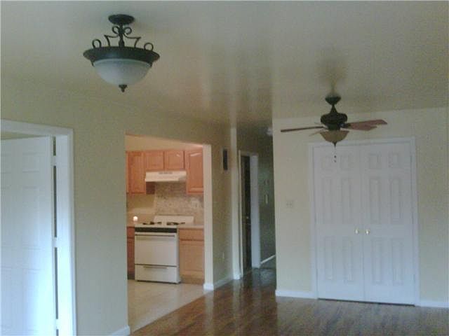 shot of kitchen before stainless steel appliances were put i