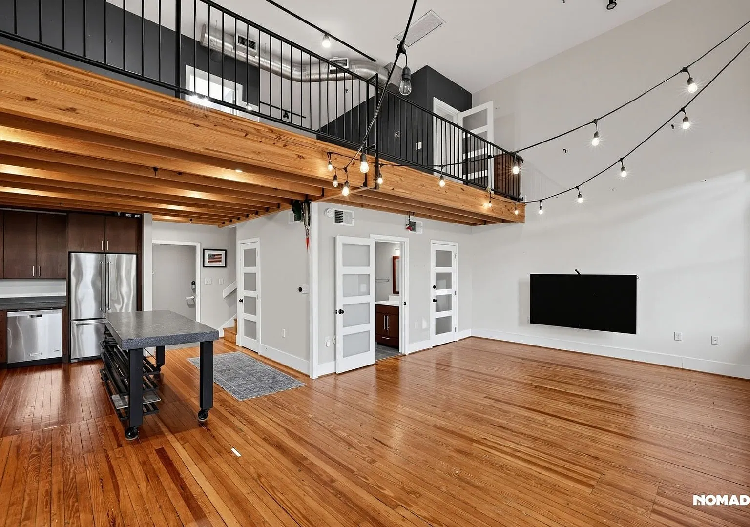 Huge Lofted Condo Overlooking Main Street — Photo 3