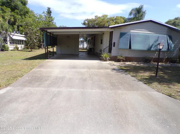 922 Yew St, Barefoot Bay, FL 32976