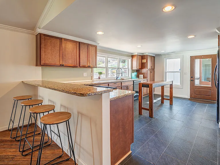 Roomy kitchen with breakfast bar