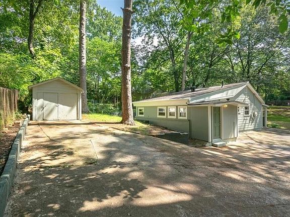 Secure shed with shelving available for additional storage (lawn equipment, sporting equipment, luggage, bicycles, etc.).