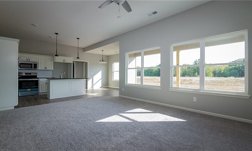 2nd image of 1314 NE White Oaks Ln