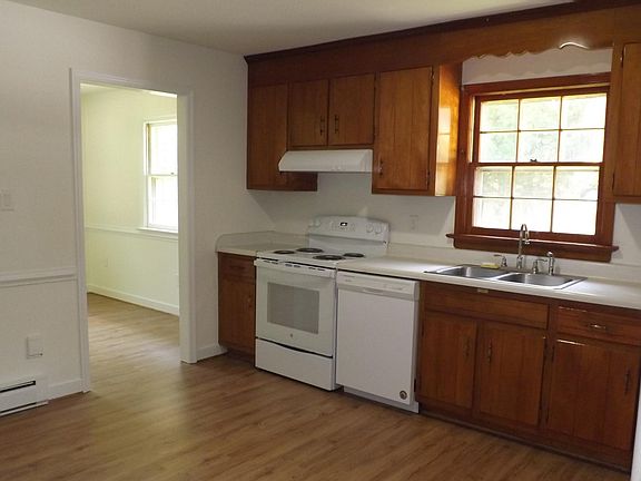 Kitchen with refinished cabinets
