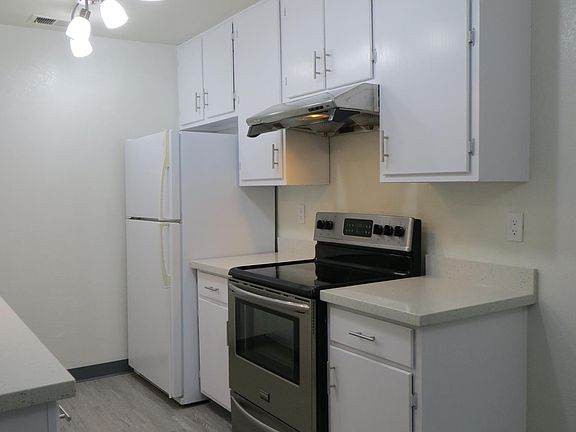 Kitchen; new lighting, newly painted cabinets & hardware, ne