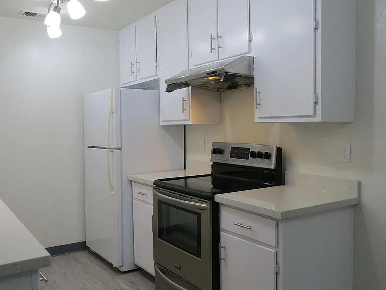 Kitchen; new lighting, newly painted cabinets & hardware, ne