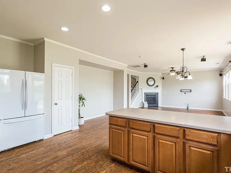 Kitchen with refrigerator