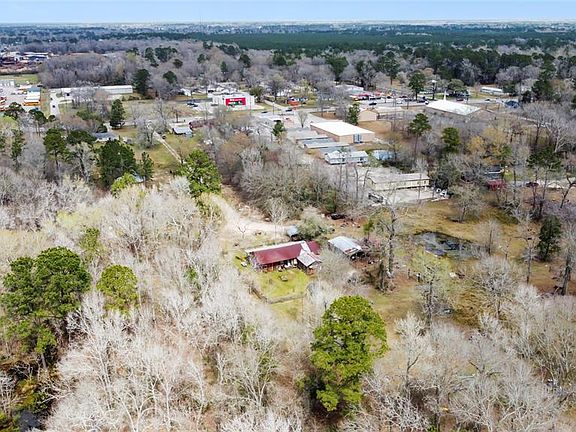 Aerial view looking North East. Splendora Bus Barn, Splendora Skating Rink and O'Reilly pictured.